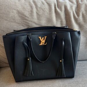 Louis Vuitton black leather bag